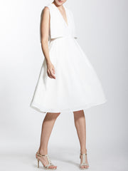 Surplice Neck Pleated Knee Length Dress with Flap Sleeves Details